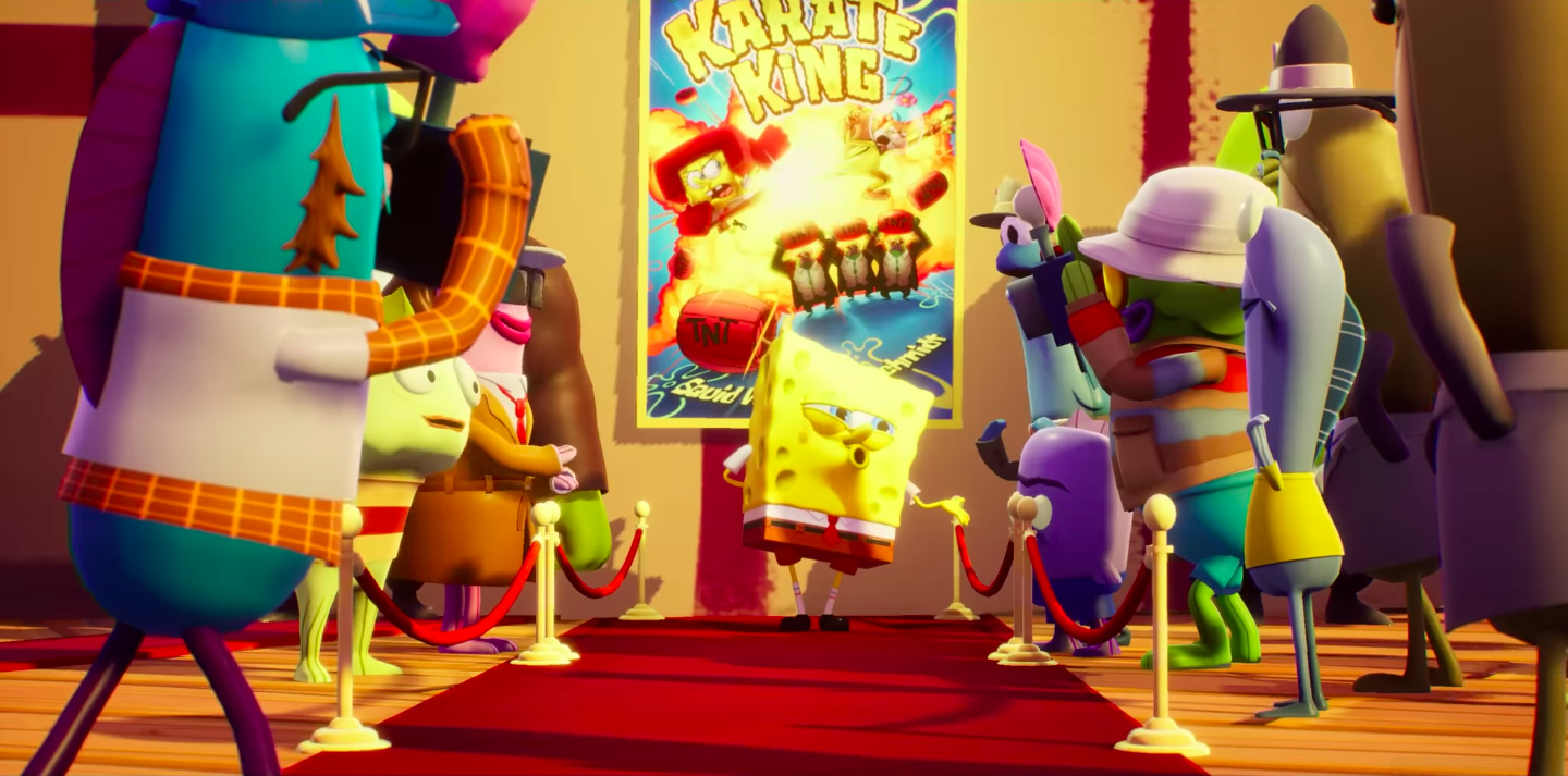 SpongeBob smiling in front of a crowd.