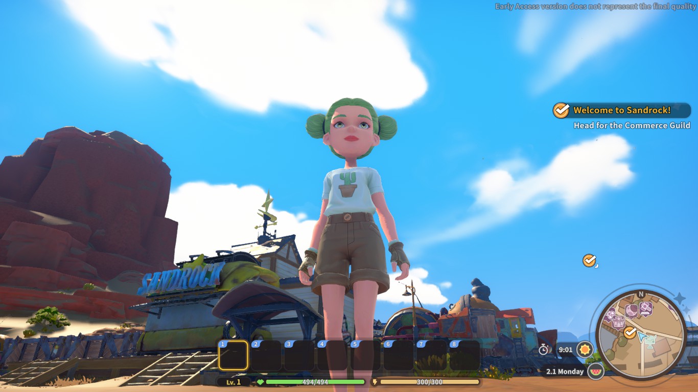 An image of a green-haired woman staring at the distance.